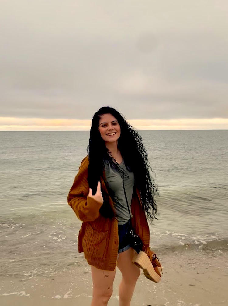 Author E.V. Zukowski pictured at the beach on the Cape Cod.